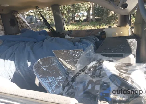 2000 Chevrolet Astro z USA, uszkodzony, nr VIN 1GNEL19W9YB169841